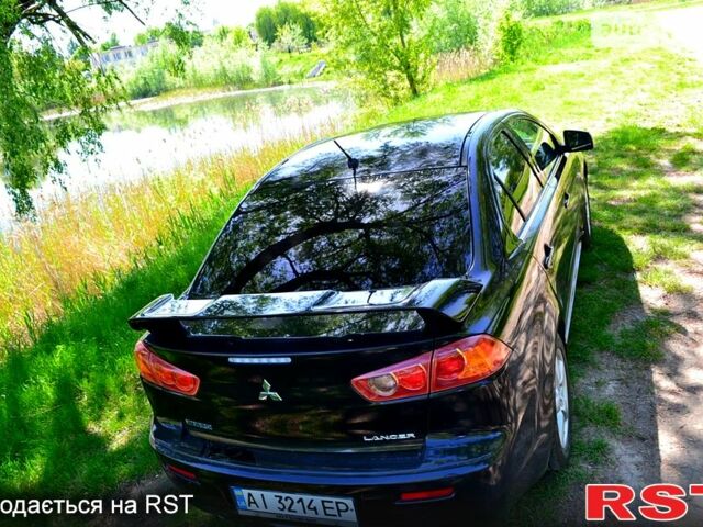 Чорний Міцубісі Lancer, об'ємом двигуна 1.8 л та пробігом 226 тис. км за 6600 $, фото 9 на Automoto.ua