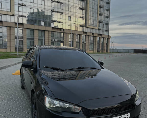 Черный Мицубиси Лансер, объемом двигателя 2 л и пробегом 245 тыс. км за 6200 $, фото 6 на Automoto.ua