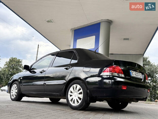 Чорний Міцубісі Lancer, об'ємом двигуна 1.6 л та пробігом 173 тис. км за 3700 $, фото 6 на Automoto.ua