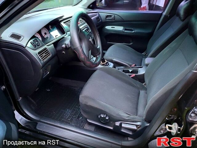 Чорний Міцубісі Lancer, об'ємом двигуна 1.6 л та пробігом 201 тис. км за 4000 $, фото 8 на Automoto.ua