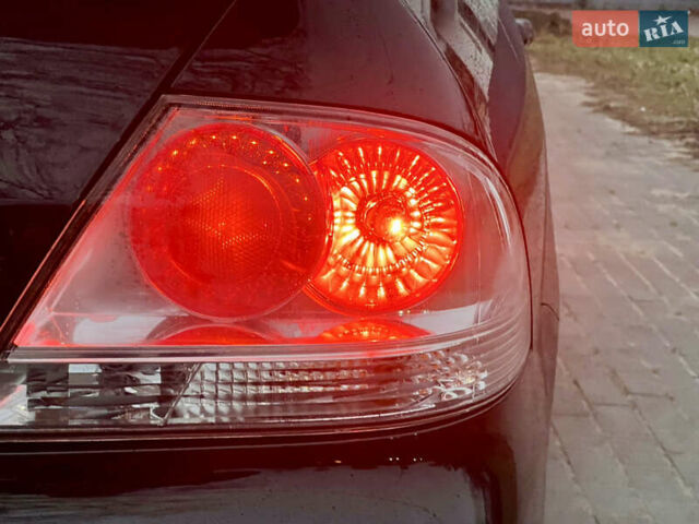 Чорний Міцубісі Lancer, об'ємом двигуна 1.6 л та пробігом 303 тис. км за 4350 $, фото 16 на Automoto.ua