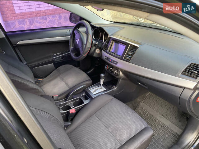 Чорний Міцубісі Lancer, об'ємом двигуна 1.5 л та пробігом 240 тис. км за 5650 $, фото 16 на Automoto.ua