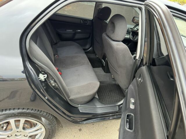 Черный Мицубиси Лансер, объемом двигателя 1.6 л и пробегом 173 тыс. км за 4700 $, фото 16 на Automoto.ua