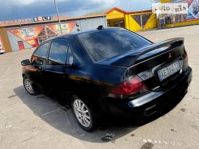 Чорний Міцубісі Lancer, об'ємом двигуна 1.6 л та пробігом 195 тис. км за 5200 $, фото 8 на Automoto.ua