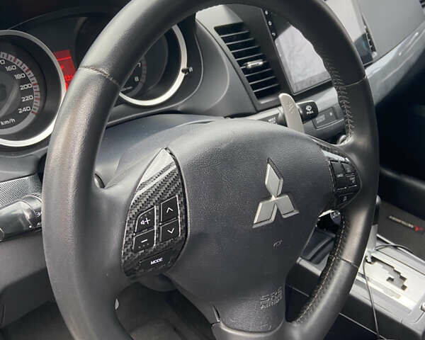 Чорний Міцубісі Lancer, об'ємом двигуна 2 л та пробігом 222 тис. км за 7500 $, фото 14 на Automoto.ua