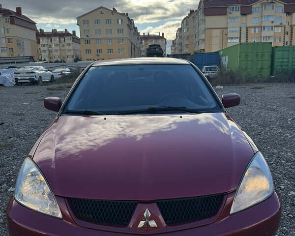 Чорний Міцубісі Lancer, об'ємом двигуна 1.6 л та пробігом 195 тис. км за 5000 $, фото 9 на Automoto.ua