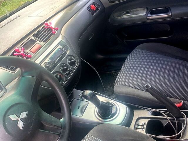 Чорний Міцубісі Lancer, об'ємом двигуна 1.6 л та пробігом 320 тис. км за 2500 $, фото 1 на Automoto.ua