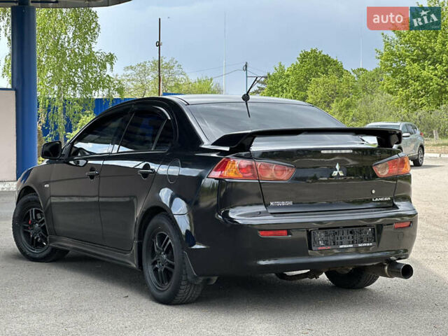 Чорний Міцубісі Lancer, об'ємом двигуна 2 л та пробігом 192 тис. км за 6500 $, фото 8 на Automoto.ua