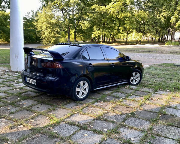 Чорний Міцубісі Lancer, об'ємом двигуна 2 л та пробігом 280 тис. км за 5200 $, фото 4 на Automoto.ua