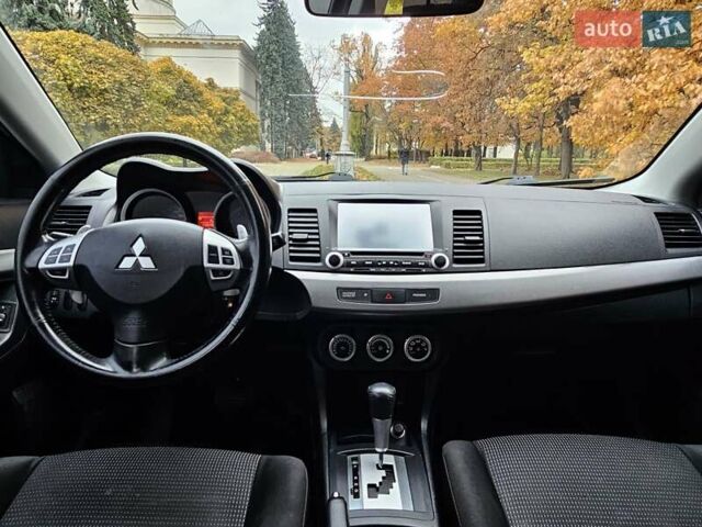 Міцубісі Lancer 2007 у Києві на Automoto.ua Чорний Міцубісі Lancer, об'ємом двигуна 2 л та пробігом 115 тис. км за 5000 $, фото 17 на Automoto.ua