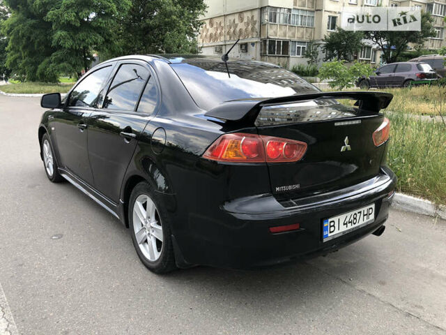 Чорний Міцубісі Lancer, об'ємом двигуна 2 л та пробігом 185 тис. км за 6950 $, фото 4 на Automoto.ua