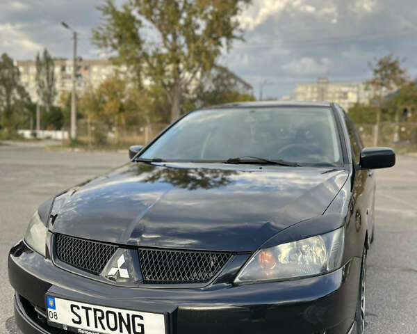 Чорний Міцубісі Lancer, об'ємом двигуна 2 л та пробігом 280 тис. км за 4600 $, фото 5 на Automoto.ua