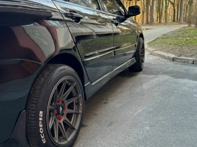 Черный Мицубиси Лансер, объемом двигателя 1.6 л и пробегом 211 тыс. км за 5600 $, фото 3 на Automoto.ua