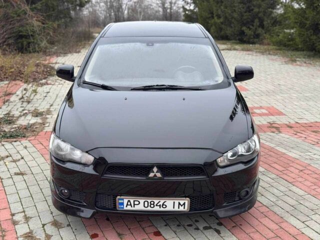 Черный Мицубиси Лансер, объемом двигателя 2 л и пробегом 217 тыс. км за 5500 $, фото 1 на Automoto.ua