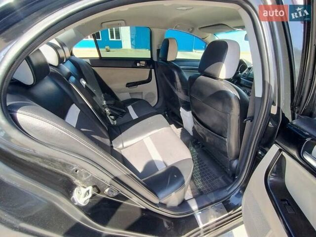 Чорний Міцубісі Lancer, об'ємом двигуна 2 л та пробігом 268 тис. км за 5000 $, фото 4 на Automoto.ua