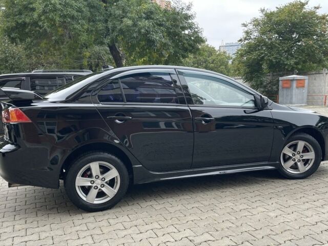 Чорний Міцубісі Lancer, об'ємом двигуна 2 л та пробігом 200 тис. км за 6800 $, фото 4 на Automoto.ua