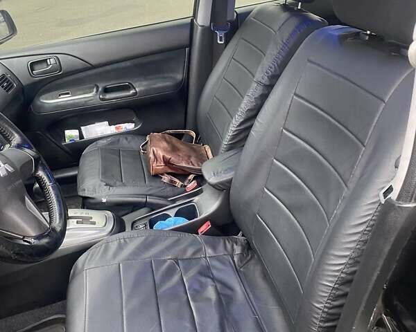 Черный Мицубиси Лансер, объемом двигателя 1.58 л и пробегом 263 тыс. км за 4000 $, фото 27 на Automoto.ua