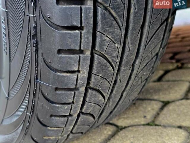 Чорний Міцубісі Lancer, об'ємом двигуна 2 л та пробігом 260 тис. км за 6555 $, фото 14 на Automoto.ua