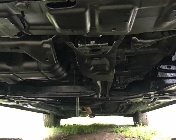 Черный Мицубиси Лансер, объемом двигателя 1.5 л и пробегом 240 тыс. км за 6900 $, фото 25 на Automoto.ua