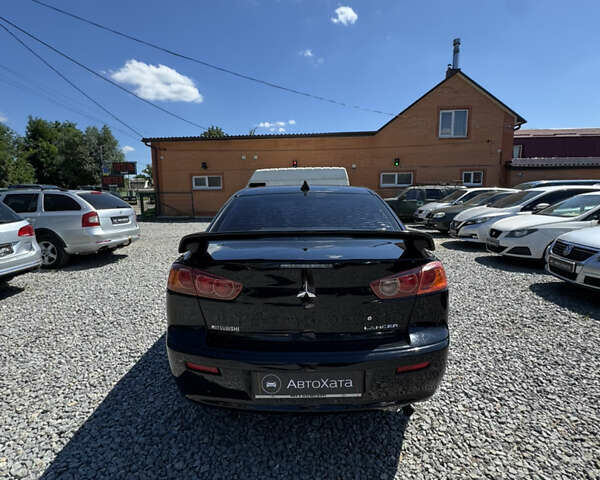 Чорний Міцубісі Lancer, об'ємом двигуна 2 л та пробігом 253 тис. км за 6400 $, фото 4 на Automoto.ua