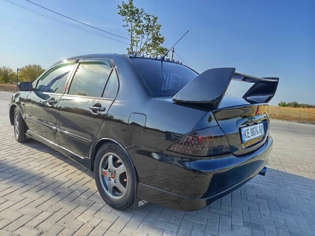 Чорний Міцубісі Lancer, об'ємом двигуна 1.6 л та пробігом 3 тис. км за 4500 $, фото 4 на Automoto.ua