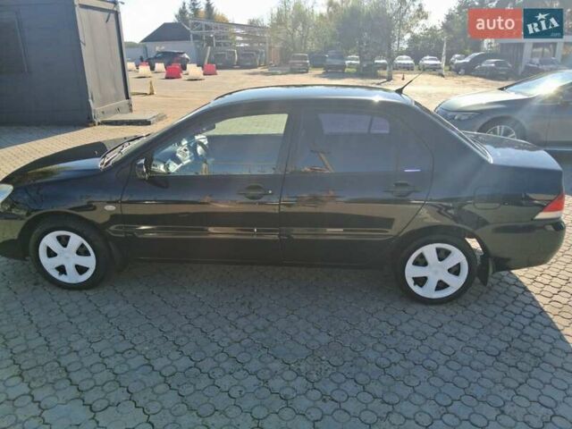 Міцубісі Lancer 2007 у Чернівцях на Automoto.ua Чорний Міцубісі Lancer, об'ємом двигуна 1.58 л та пробігом 247 тис. км за 4300 $, фото 9 на Automoto.ua