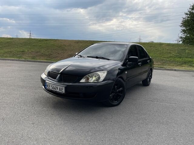 Чорний Міцубісі Lancer, об'ємом двигуна 1.6 л та пробігом 260 тис. км за 4600 $, фото 1 на Automoto.ua
