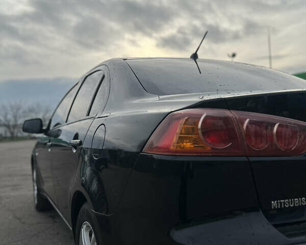 Чорний Міцубісі Lancer, об'ємом двигуна 1.5 л та пробігом 209 тис. км за 5500 $, фото 14 на Automoto.ua