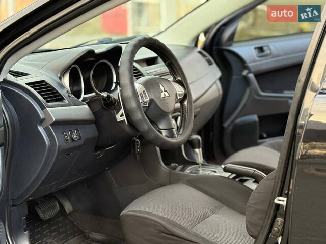Мицубиси Лансер 2007 в Днепре (Днепропетровске) на Automoto.ua Черный Мицубиси Лансер, объемом двигателя 2 л и пробегом 223 тыс. км за 6300 $, фото 8 на Automoto.ua
