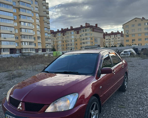 Чорний Міцубісі Lancer, об'ємом двигуна 1.6 л та пробігом 195 тис. км за 5000 $, фото 21 на Automoto.ua