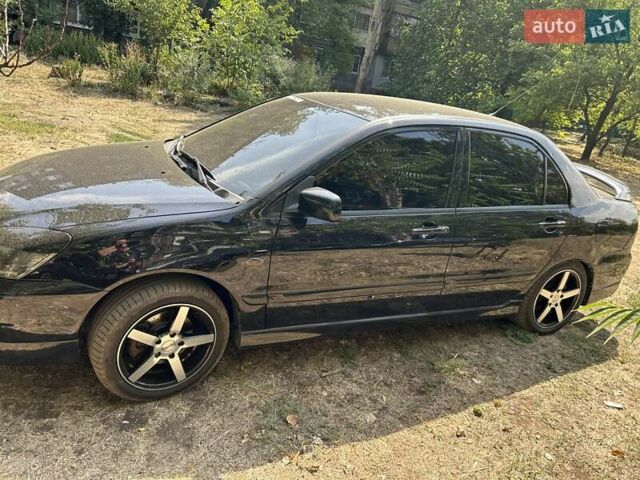 Мицубиси Лансер 2007 в Краматорске на Automoto.ua Черный Мицубиси Лансер, объемом двигателя 2 л и пробегом 193 тыс. км за 6250 $, фото 2 на Automoto.ua