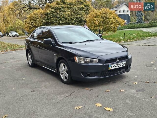 Міцубісі Lancer 2007 у Києві на Automoto.ua Чорний Міцубісі Lancer, об'ємом двигуна 2 л та пробігом 115 тис. км за 5000 $, фото 12 на Automoto.ua