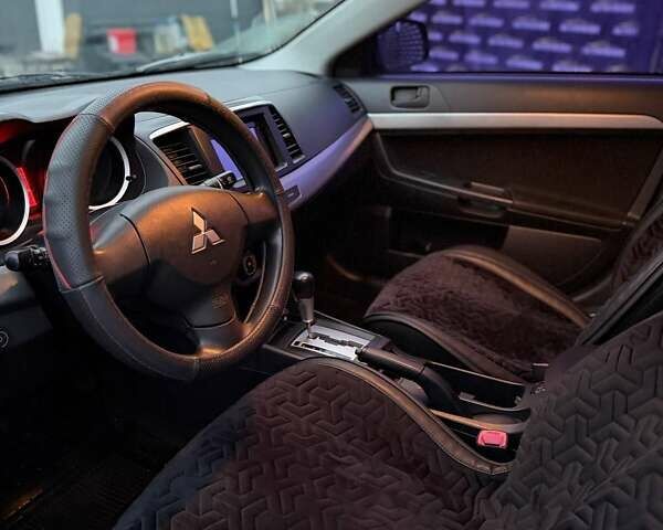 Черный Мицубиси Лансер, объемом двигателя 1.5 л и пробегом 245 тыс. км за 4499 $, фото 6 на Automoto.ua