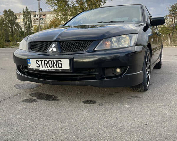 Чорний Міцубісі Lancer, об'ємом двигуна 2 л та пробігом 280 тис. км за 4600 $, фото 7 на Automoto.ua