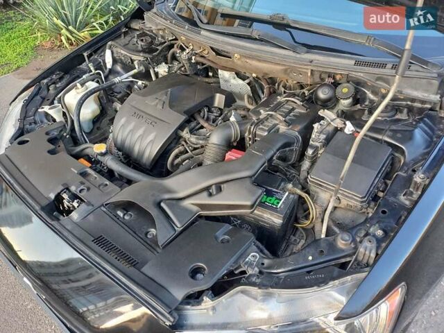 Чорний Міцубісі Lancer, об'ємом двигуна 1.5 л та пробігом 242 тис. км за 5550 $, фото 48 на Automoto.ua
