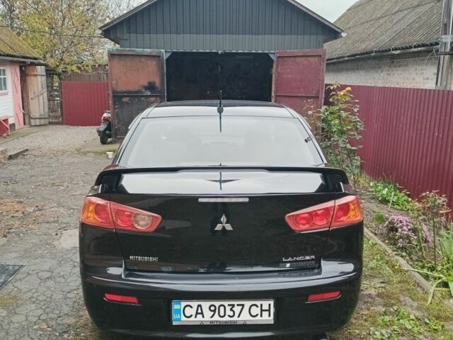 Чорний Міцубісі Lancer, об'ємом двигуна 2 л та пробігом 273 тис. км за 7100 $, фото 3 на Automoto.ua