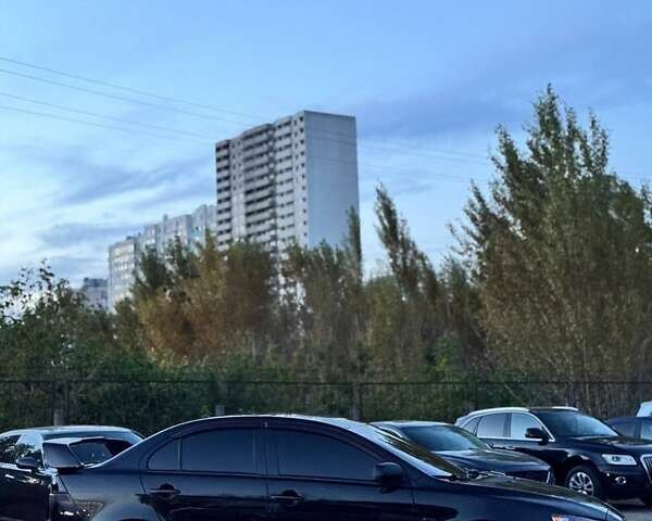 Черный Мицубиси Лансер, объемом двигателя 2 л и пробегом 200 тыс. км за 3850 $, фото 2 на Automoto.ua