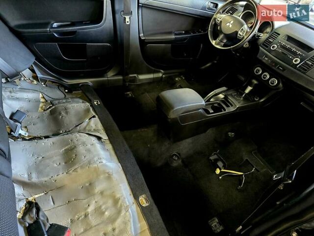 Чорний Міцубісі Lancer, об'ємом двигуна 2 л та пробігом 260 тис. км за 6555 $, фото 45 на Automoto.ua