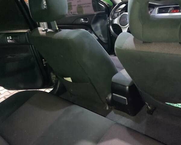 Чорний Міцубісі Lancer, об'ємом двигуна 2 л та пробігом 145 тис. км за 5000 $, фото 8 на Automoto.ua