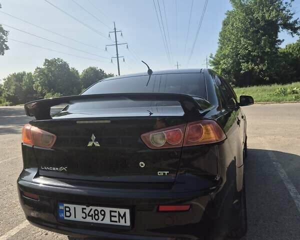 Чорний Міцубісі Lancer, об'ємом двигуна 2 л та пробігом 243 тис. км за 6600 $, фото 4 на Automoto.ua