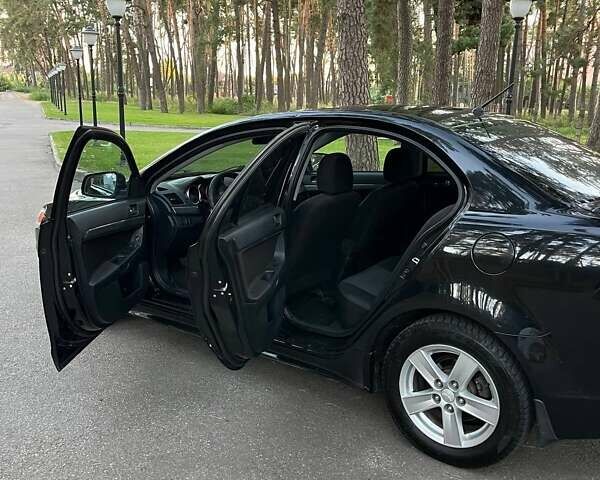 Чорний Міцубісі Lancer, об'ємом двигуна 2 л та пробігом 230 тис. км за 6800 $, фото 9 на Automoto.ua