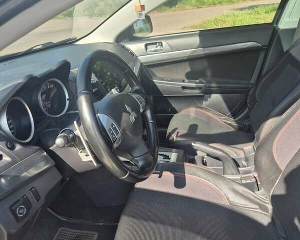 Чорний Міцубісі Lancer, об'ємом двигуна 2 л та пробігом 243 тис. км за 6600 $, фото 20 на Automoto.ua
