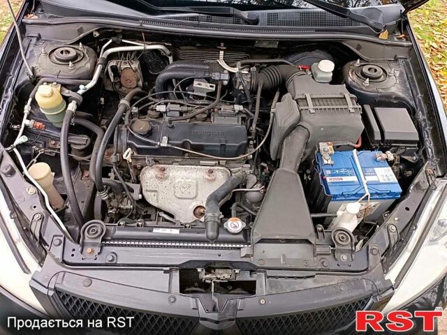 Чорний Міцубісі Lancer, об'ємом двигуна 1.6 л та пробігом 227 тис. км за 4100 $, фото 10 на Automoto.ua