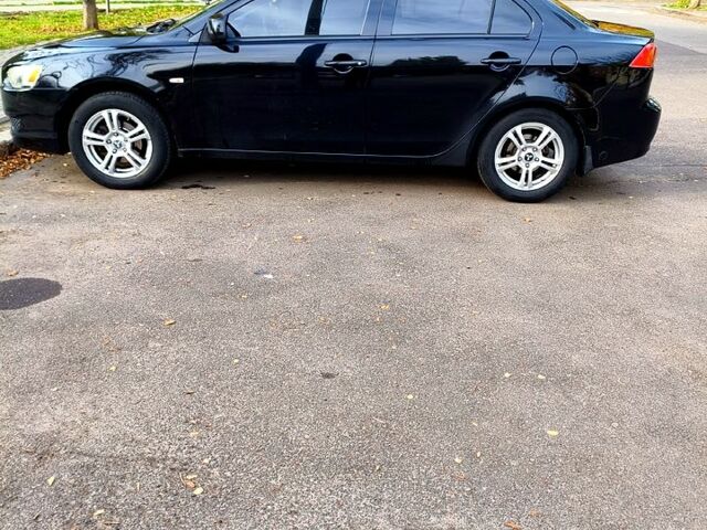 Черный Мицубиси Лансер, объемом двигателя 1.5 л и пробегом 207 тыс. км за 5500 $, фото 4 на Automoto.ua