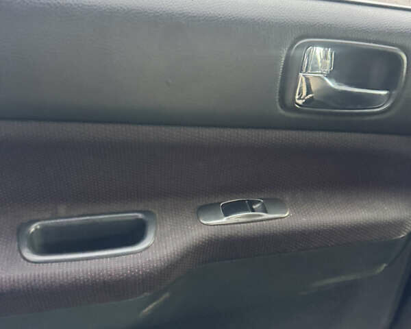 Чорний Міцубісі Lancer, об'ємом двигуна 2 л та пробігом 210 тис. км за 5500 $, фото 25 на Automoto.ua