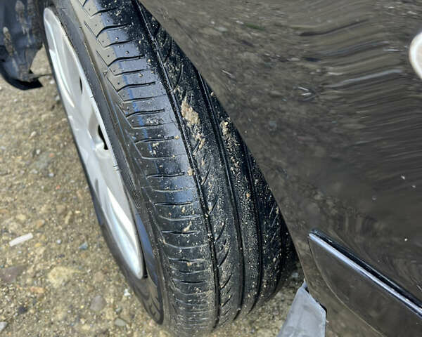 Чорний Міцубісі Lancer, об'ємом двигуна 1.58 л та пробігом 185 тис. км за 3750 $, фото 8 на Automoto.ua