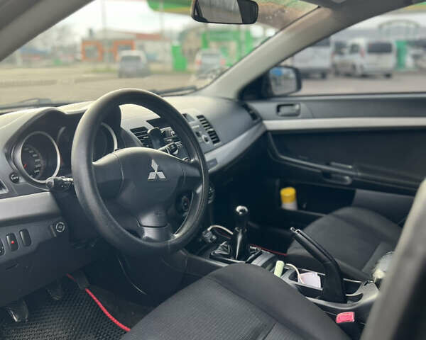 Чорний Міцубісі Lancer, об'ємом двигуна 1.5 л та пробігом 209 тис. км за 5500 $, фото 16 на Automoto.ua