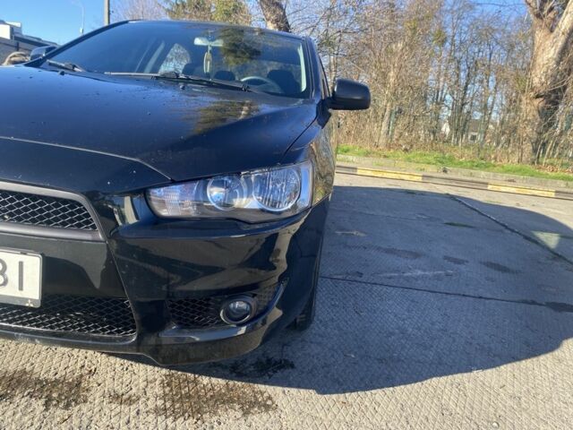 Черный Мицубиси Лансер, объемом двигателя 2 л и пробегом 372 тыс. км за 6200 $, фото 2 на Automoto.ua