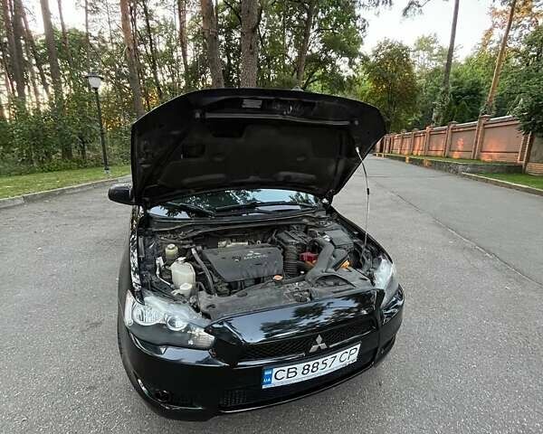 Чорний Міцубісі Lancer, об'ємом двигуна 2 л та пробігом 230 тис. км за 6800 $, фото 12 на Automoto.ua