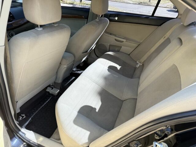 Чорний Міцубісі Lancer, об'ємом двигуна 1.5 л та пробігом 207 тис. км за 6400 $, фото 6 на Automoto.ua